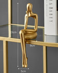 Helvano | Abstrakte Skulptur aus Metall in Gold