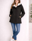 Helvano | Lange Winterjacke mit Kapuze und Futter für Damen
