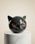 Helvano | Schwarze Katzenkopf-Skulptur mit hypnotischen Augen