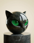 Helvano | Schwarze Katzenkopf-Skulptur mit hypnotischen Augen
