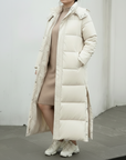 Helvano | Lange Steppjacke mit Kapuze für Damen in Übergrösse