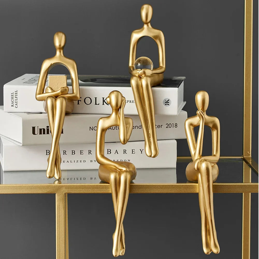 Helvano | Abstrakte Skulptur aus Metall in Gold