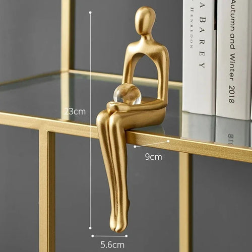 Helvano | Abstrakte Skulptur aus Metall in Gold
