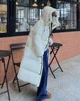Helvano | Lange Pufferjacke mit Kapuze für Damen