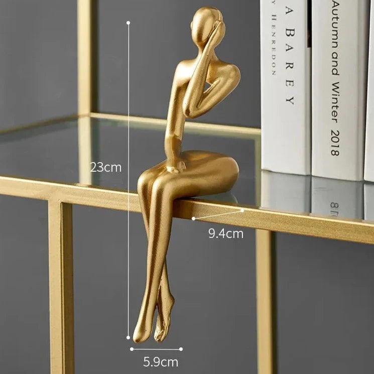 Helvano | Abstrakte Skulptur aus Metall in Gold